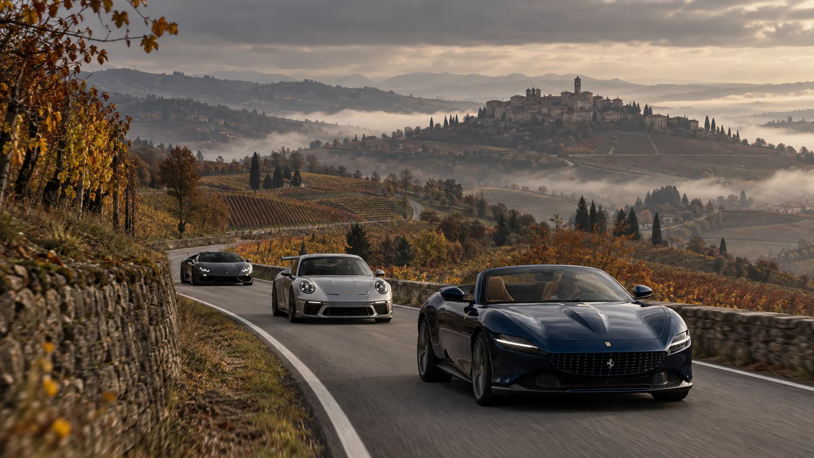 Three sports cars driving together on a panoramic Langhe road; illustrative visual